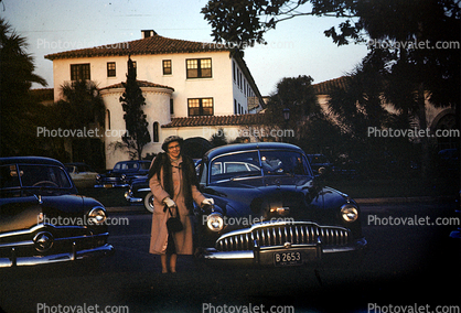 Woman, formal dress, coat, cold, home, house, cars, Oldsmobile, Ford, vehicles, 1950s
