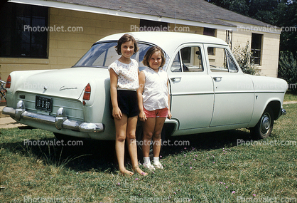 Girls, Sisters, siblings, Ford Consul, Shelton, car, automobile, sedan, Vehicle, Albany Georgia, September 5 1957, 1950s
