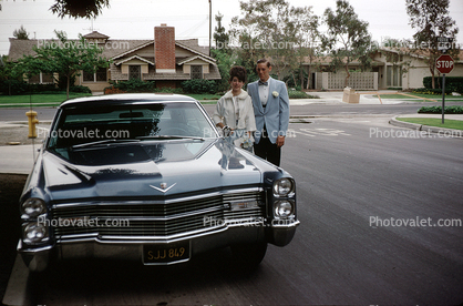 Cadillac, Couple, homes, suburbia, suburban, 1960s