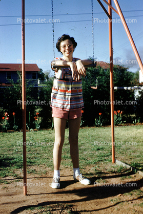 Swing Set, girl, smiles, backyard, 1950s