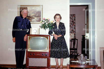 Television, Living Room, Man, Woman, dress, table, 