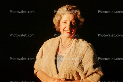 Smiling Lady, woman, jacket, necklace, June 1986, 1980s