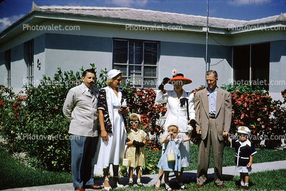 Family Group Portrait, girls, man, woman, front yard, home, house, 1950s