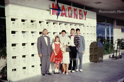 Mackey Airlines Terminal building, Family Group Portrait, man, woman, 1960s