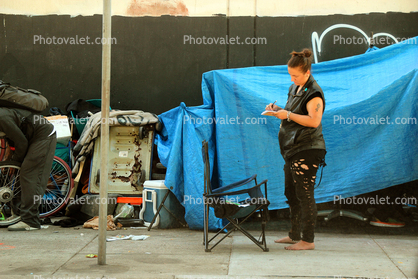 Woman at Homeless encampment, Sidewalk, streets of San Francisco