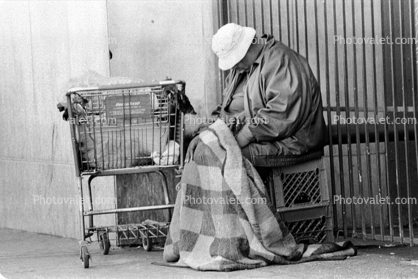 Sleeping Homeless Woman with Shopping Cart