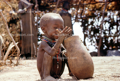 Boy eating from a bowl, Lake Turkana, refugee, African Diaspora