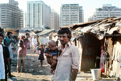 Father with Baby Boy, slum, apartments, buildings, contrast, rich, poor, Nariman Point