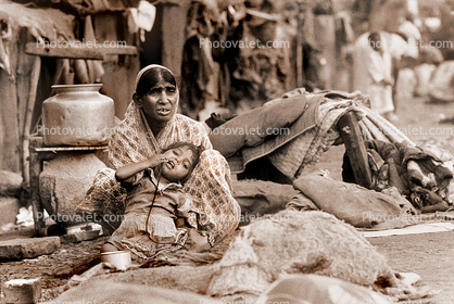 Woman with Daughter, Mother, selling items