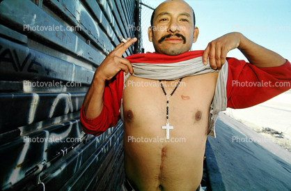 man, cross, chest, Illegal immigrant