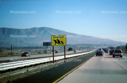 Caution Illegal Immigrant Crossing, Roadsign, cars, Interstate Highway I-5, warning, Camp Pendalton