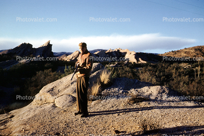 desert, rifle, hunter, man, Vasquez Rocks, December 1958, 1950s