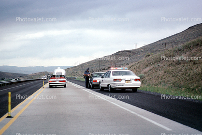 squad car, giving out a traffic ticket, Highway 395