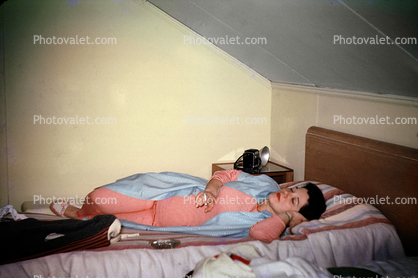 Woman Falling Asleep in Bed with a Cigarette, camera