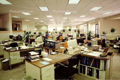 cluttered open office, cubicles, paper, computers, desks, in-out files, stacks, vanishing point, 23 August 1985, 1980s