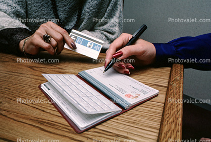 writing check, checkbook, pen, women, hands, fingernails, desk, 1980s
