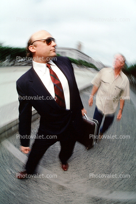 Businessman, briefcase, walking, politician, homeless man, anger, angry, yelling