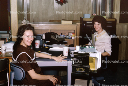Women in a 1960s Office, desk, smiles, December 1966