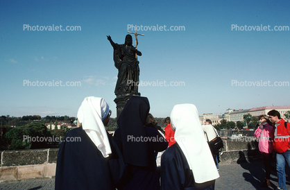 Nuns, Jesus Statue, cross, Saint Charles Bridge, Prague, Czech Republic