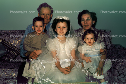 First Holy Communion, Catholic, Girl, Father, Mother, Daughter, Son, girls, dresses, formal, 1950s
