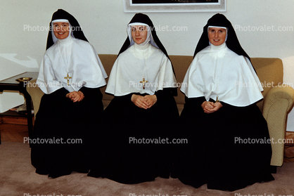 Nuns Sitting, Christian Cross, smiles, women, couch, 1950s