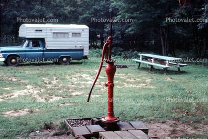 Water Hand Pump, Picnic Bench, Camper Shell, Pick up truck