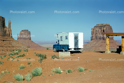 Pickup truck with camper, Monument Valley, Arizona, 1960s