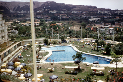 Hotel swimming pool, umbrellas, Caracas, Venezuela