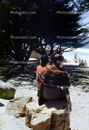 Beach, women, mink stole, fur shawl, Carmel California, April 1950, 1950s