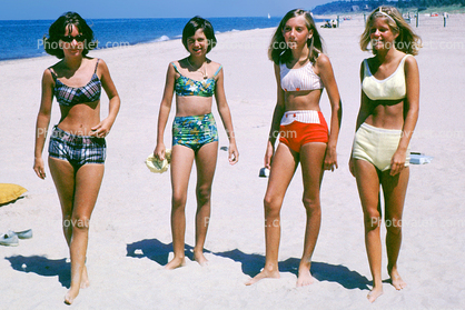 Girls walking on the beach, June 1964, 1960s