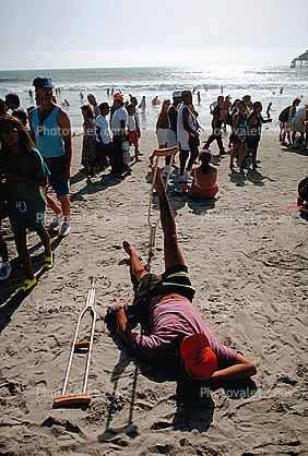 man, male, crutches, sand, people, Imperial Beach, San Diego