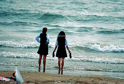 School Girls on the Beach, barefoot on the beach