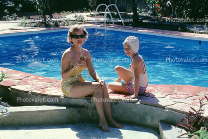 Sitting by the Pool, drink in hand, 1960s