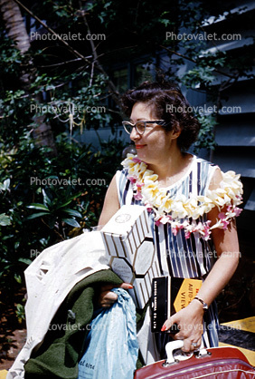 retro, lei, woman, cateye glasses, luggage, April 1961, 1960s