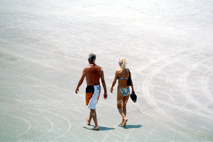 beach and sand, man and Woman Walking, Strolling