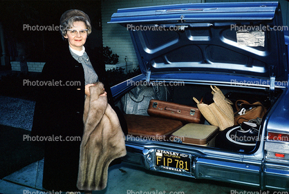 Woman with a Fur Coat, car trunk, bags, baggage, luggage, suitcase, 1965, 1960s