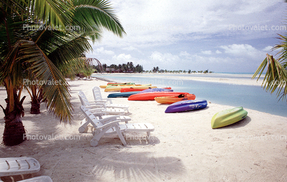 beach, sand sun, ocean, water, palm trees, lounge chairs, Aitutaki, Cook Islands