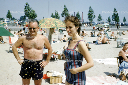 Man, Woman, beach, sand, sun, 1958, 1950s