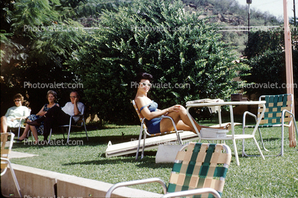 Woman, tanning, chair, resting, glasses, 1960s