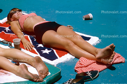 laying on a confederate flag, racist, dirty feet, 1965, 1960s