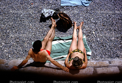 Man, Woman, Pebbles, Bikini, Beach, Tanning, Suntan, Sunburn, Sun Worshippers, Nice, France, 1960s