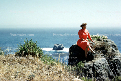 female, woman, women, sitting, dress, Lady, retro, rock, shoreline, coast, coastal, 1950s