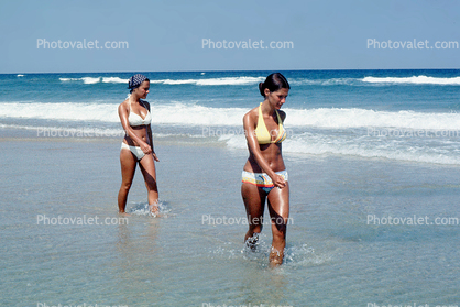 Woman wading, walking, beach, ocean, waves, suntan, sun exposure, sun burn, 1976, 1970s