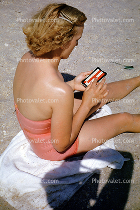 Hand held device, retro, beach, woman, 1950s