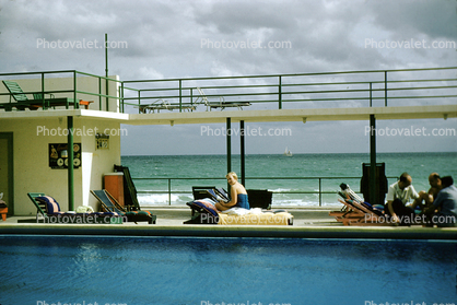 swimming pool, hotel, beach, surf, waves, 1950s