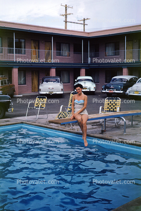 Woman sits on a Diving Board, Swimming Pool, water, Cars, Vehicles, Automobiles, Motel Building, 1954