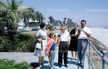 Women, Men, girl, Santa Monica Palisades, bluff, beach, November 1964, 1960s