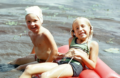 Smiling Girl and Boy, wet, air mattress, Swimsuit, 1960s