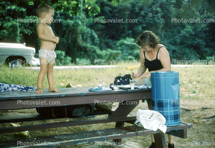 Boy Standing on a Picnic Table