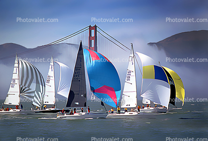 sailboats pulling in the wind